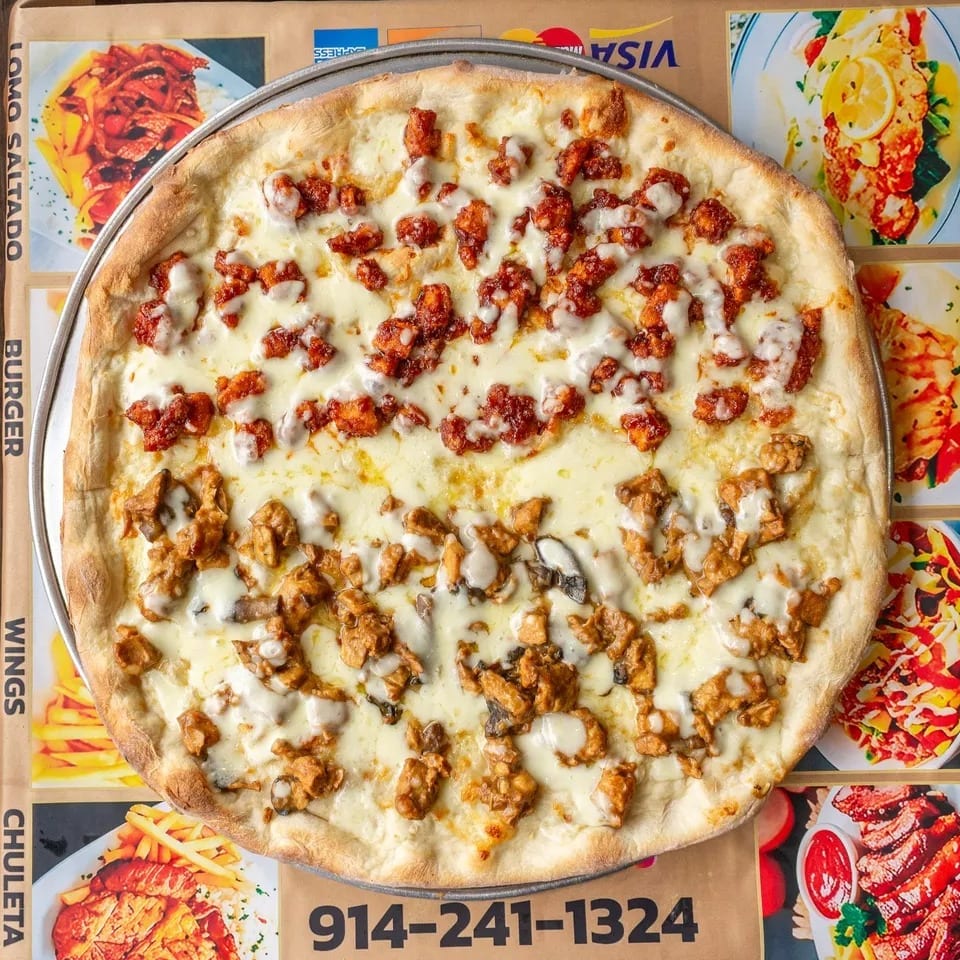 A large pizza with two different toppings, one spicy red and one savory brown, on a menu background.